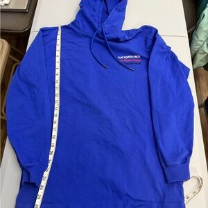 The North Face Blue long sleeve hooded shirt, men’s size small